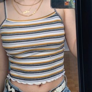 Striped tank top w/ lettuce trimming at the bottom